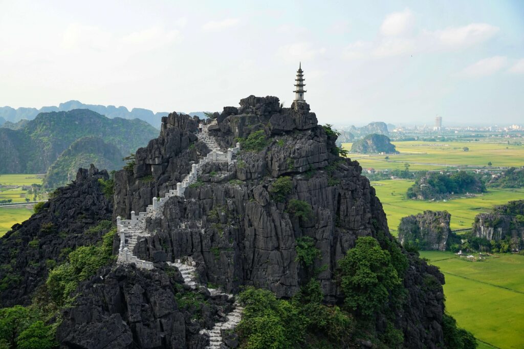 Stone steps leading to the Lying Dragon Mountain pagoda in Ninh Bình
