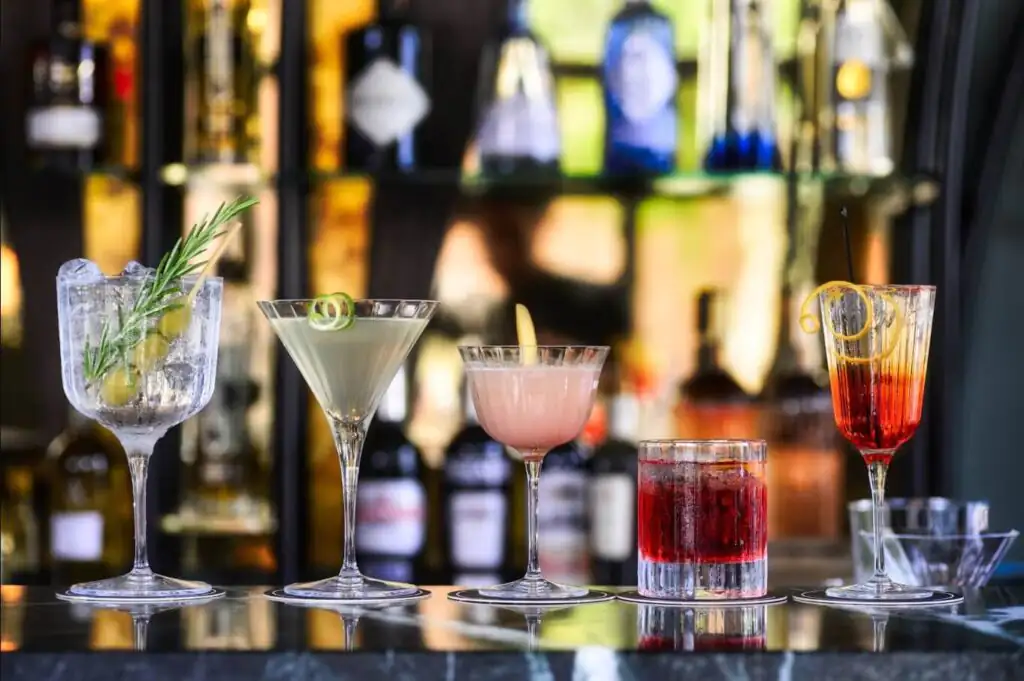 A rainbow of frozen cocktails lined up on the bar at Wet Willies