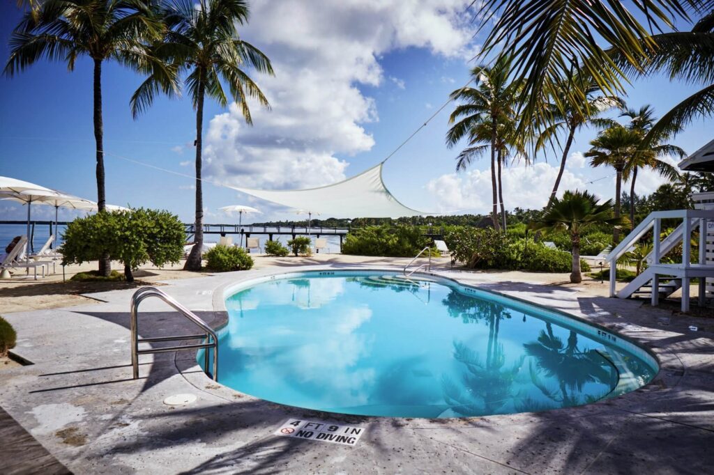 Casa Morada’s poolside oasis on a sandy waterfront