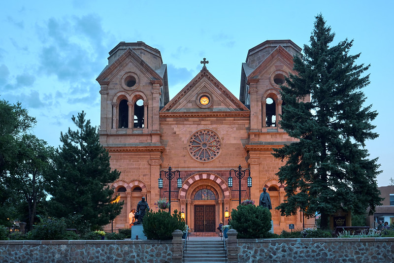 Cathedral Basilica of St. Francis glimmers in twilight, downtown Santa Fe
