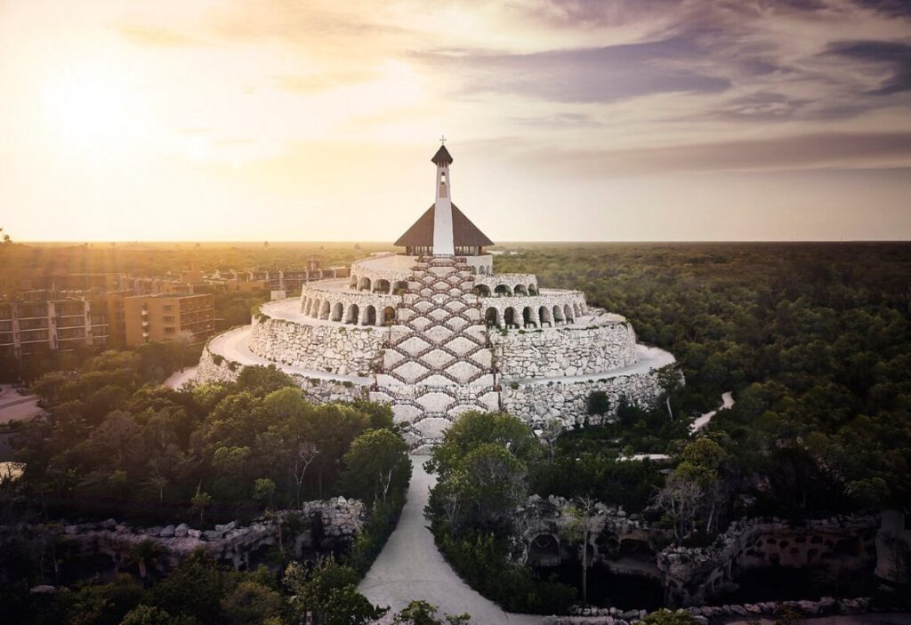 Circular chapel atop Hotel Xcaret México rises from the Riviera Maya jungle