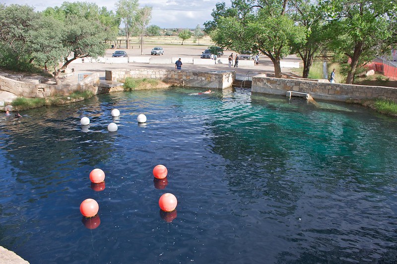 Crystal sinkhole Blue Hole of Santa Rosa shimmers amid high-plains heat