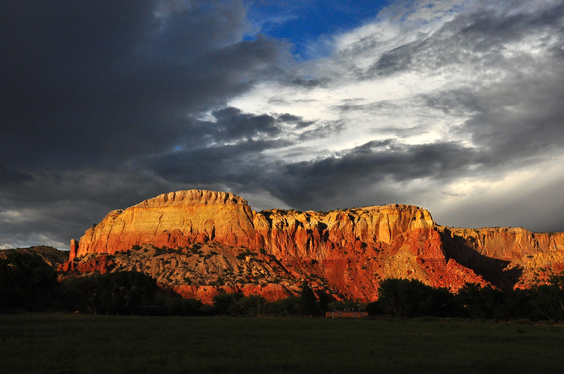 Golden cliffs glow after storm at Ghost Ranch, Abiquiú, New Mexico