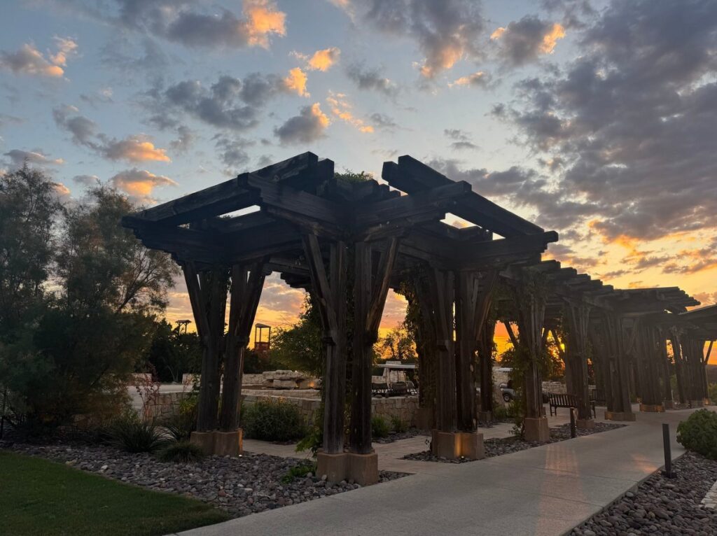 Miraval Austin’s sunset silhouette of anglers fishing from a beachside table
