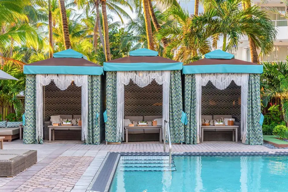 National Hotel’s palm-shaded poolside cabanas and retro chairs
