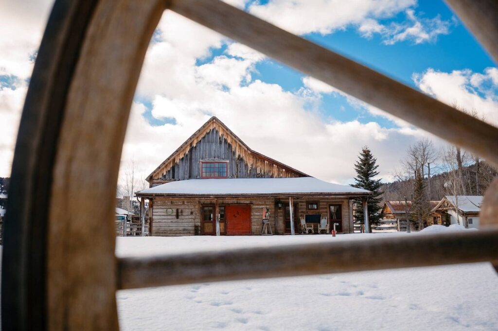 The Ranch at Rock Creek’s cozy timber bunk room with vaulted ceiling and bedroom cubbies
