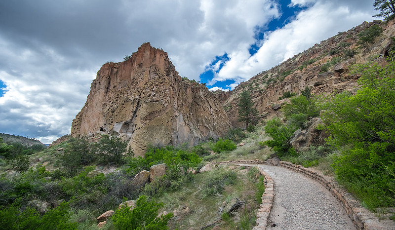 Volcanic-tuff canyon Bandelier National Monument threads a rugged cliffside path