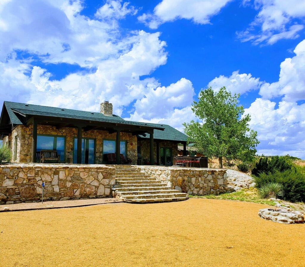 Warmly lit living area inside Dove’s Rest Cabins nestled in the Texas Hill Country