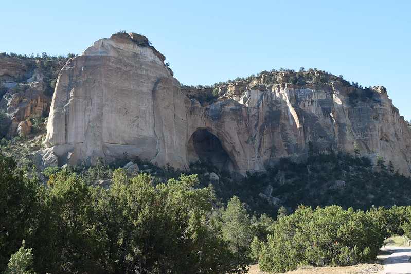 Wind-carved La Ventana Arch, El Malpais frames the open desert sky