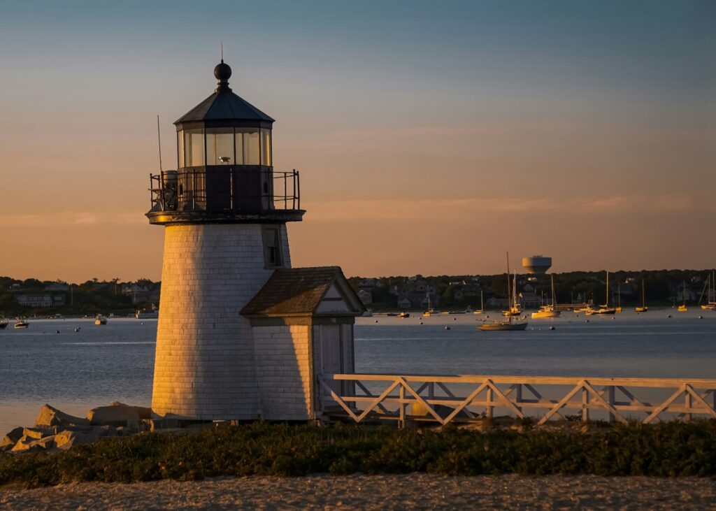 Historic Brant Point Lighthouse glows at sunset in Nantucket, Massachusetts