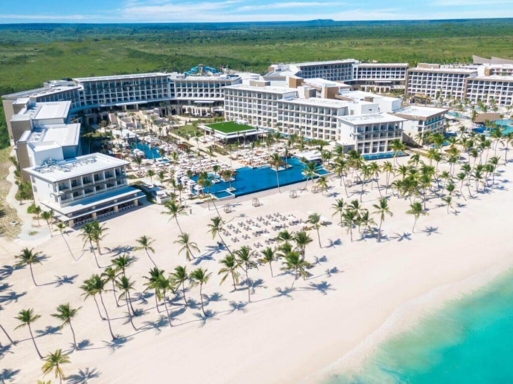 Palm-fringed sands stretch beyond infinity pools at Hyatt Zilara Cap Cana, Dominican Republic
