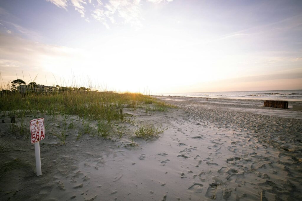 Sunrise paints the dunes and ocean at Hilton Head, South Carolina