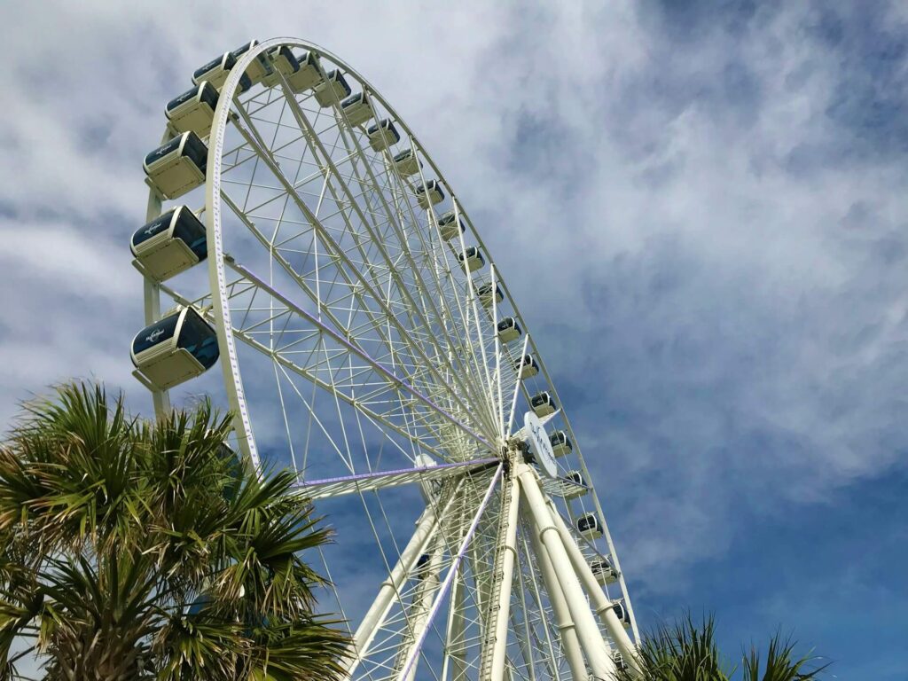 The soaring SkyWheel against blue skies on Myrtle Beach, South Carolina