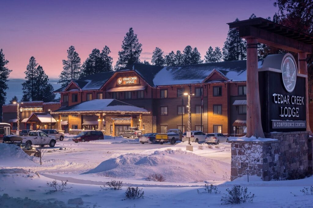 Festive winter façade of Cedar Creek Lodge & Conference Center at Cedar Creek Lodge