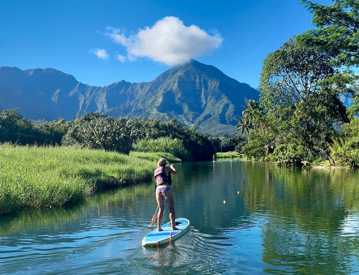 Serene paddle on the Hanalei River, Kauai, Hawaii
