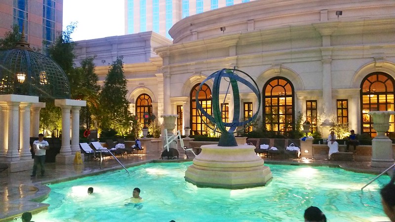 The Venetian Pool Rest Beside the Water With Cabanas and Lounge Chairs
