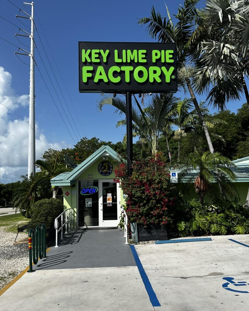 Blond Giraffe Eats Key Lime Pie Near Islamorada